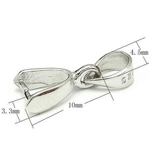 May include: Silver-toned metal pendant bail with a loop opening on one side and a flat, rounded end on the other. The bail measures 10 mm in length, 4.5 mm in width, and 3.3 mm in height.