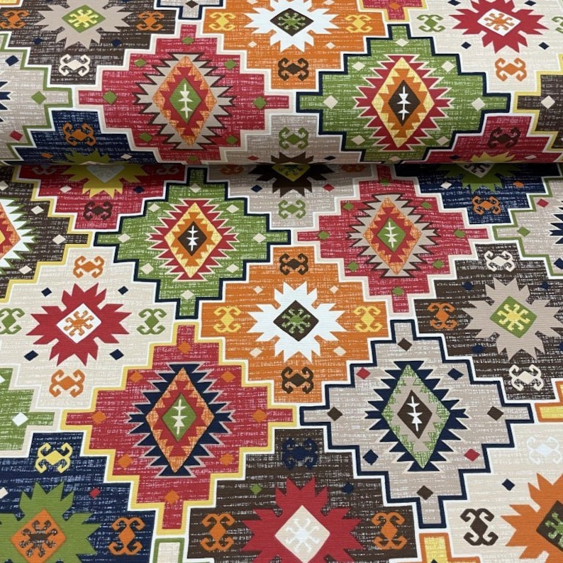 May include: Multicolored fabric with a geometric pattern featuring a mix of red, orange, green, blue, brown, and white. The pattern is reminiscent of traditional Native American or Southwestern designs.