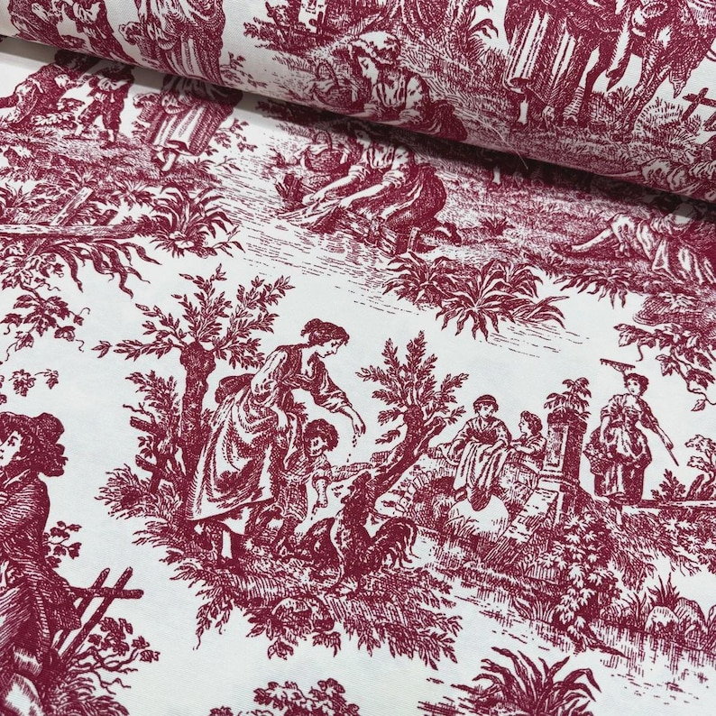 May include: White fabric with a burgundy toile de Jouy pattern. The design depicts pastoral scenes with figures, trees, and architectural elements. The fabric is likely cotton or similar, suitable for sewing projects.
