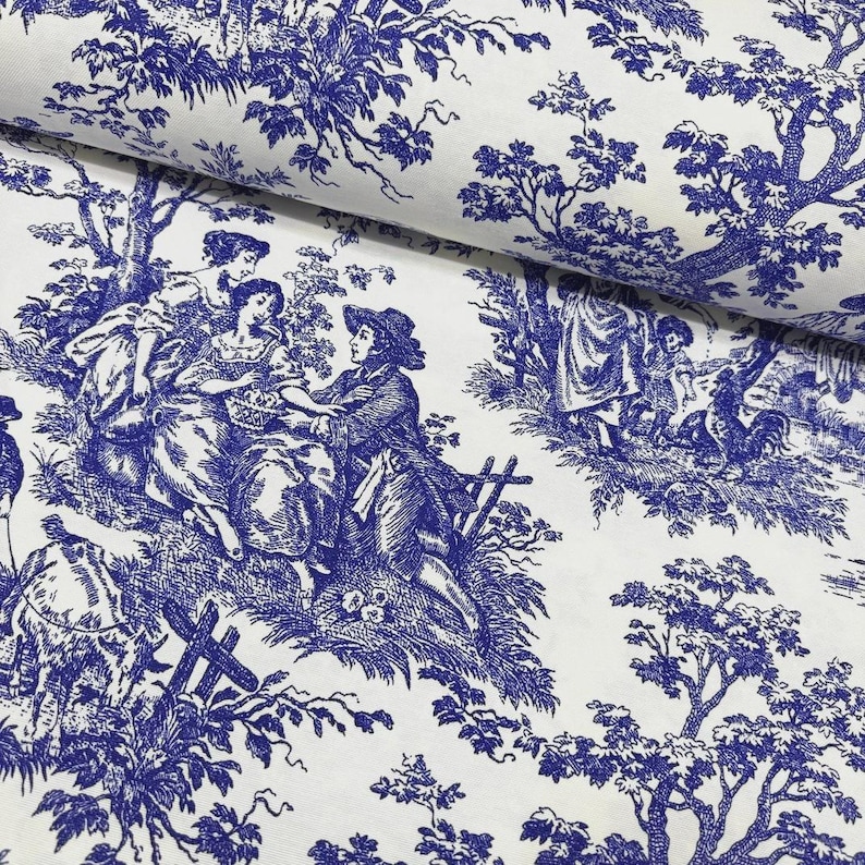 May include: White fabric featuring a blue toile design. The pattern shows scenes of people in a rural setting, with figures, trees, and animals. The fabric is folded, revealing the pattern's repeat.