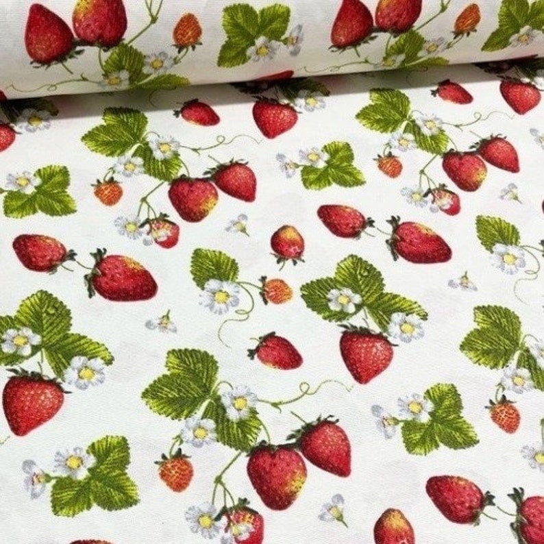 Red strawberries green leaves and white strawberry flowers printed on white cotton canvas water repellent fabric