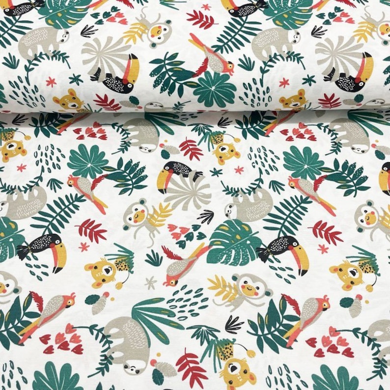 May include: White fabric with a repeating pattern of jungle animals, including toucans, sloths, monkeys, and parrots. The animals are surrounded by green leaves and red flowers.