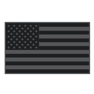 May include: A black and gray American flag patch. The stars are gray and the stripes are black.