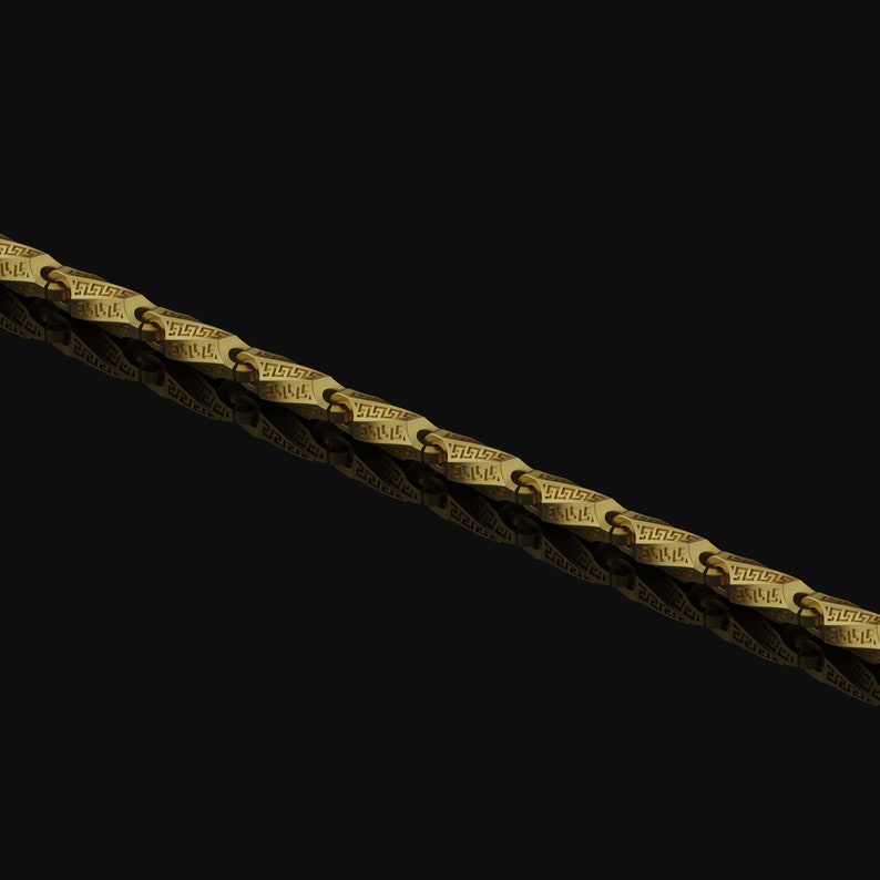 May include: A gold chain with a repeating pattern of interlocking links. The chain is made of a thick, durable metal and has a polished finish.