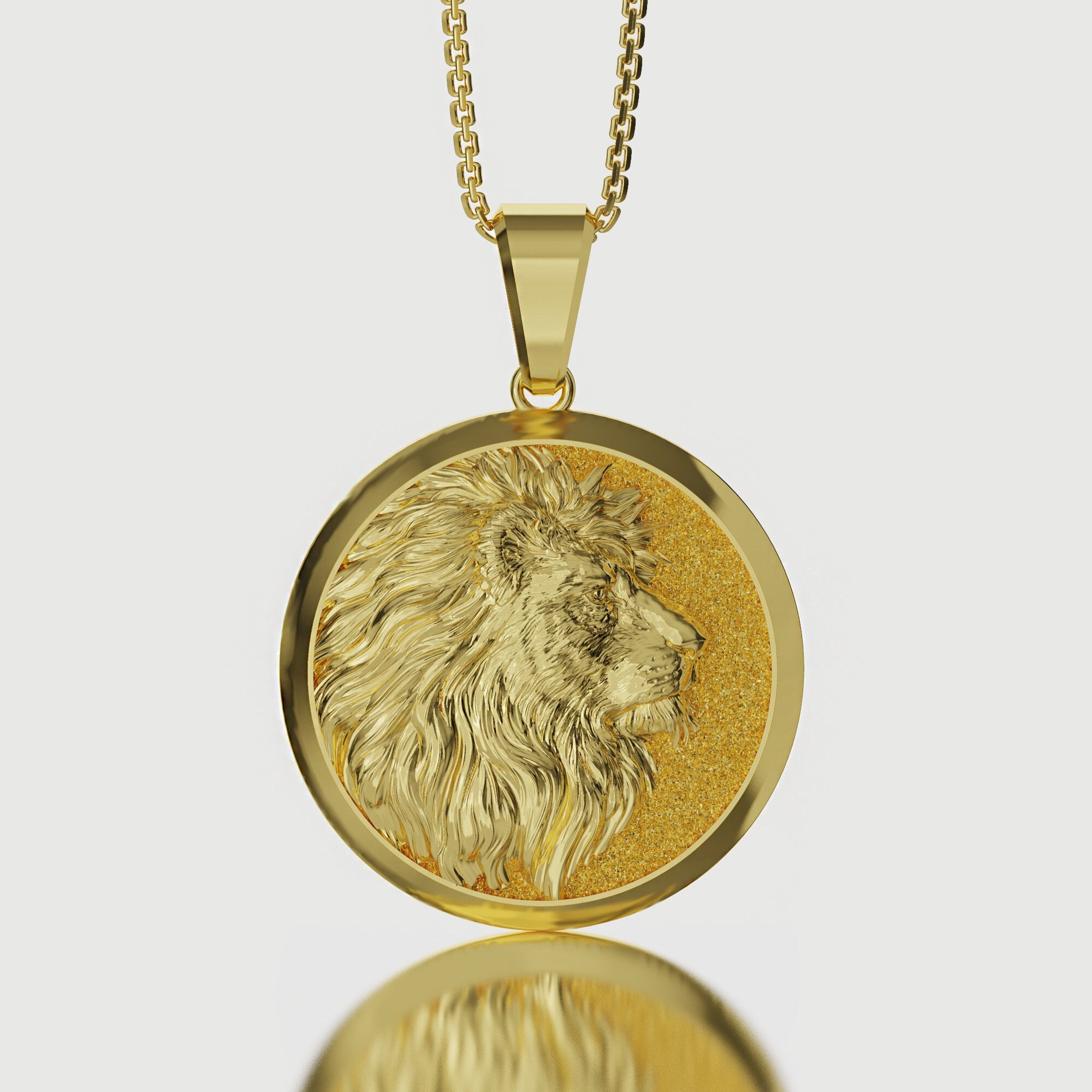 Gold lion pendant meaning sale