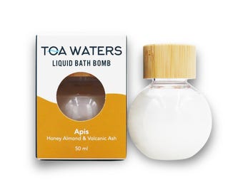 Bomba de baño líquida Apis - Miel, almendra y ceniza volcánica - TOA Waters - 50 ml