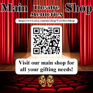 May include: A red velvet theater curtain backdrop with a QR code and the text "Main Theatre Shop Memories" and "https://www.etsy.com/uk/shop/Vcre8iveShop". Below the QR code is a white rectangle with the text "Visit our main shop for all your gifting needs!" and two gold theatrical masks.