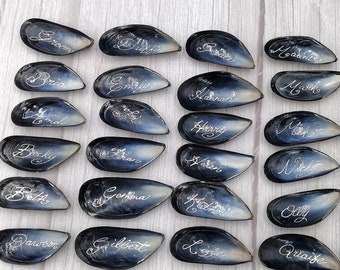 Beach-Wedding Place Names on Mussel Shells With Calligraphy Ink for Small, Intimate Events