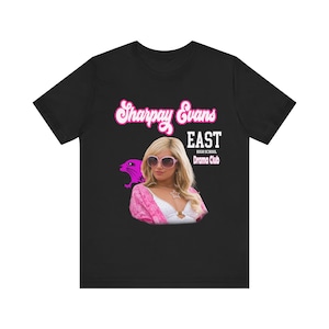 May include: Black t-shirt with a pink graphic of Sharpay Evans from the movie High School Musical. The graphic includes the text "Sharpay Evans", "East High School", and "Drama Club".