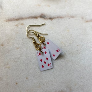 Orecchini di carte minuscole