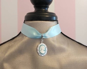 Satin Cameo Choker with Silver Plated Setting; Wedgewood Blue Ribbon Choker with Silhouette Cameo; African & White Silhouette Cameo Chokers