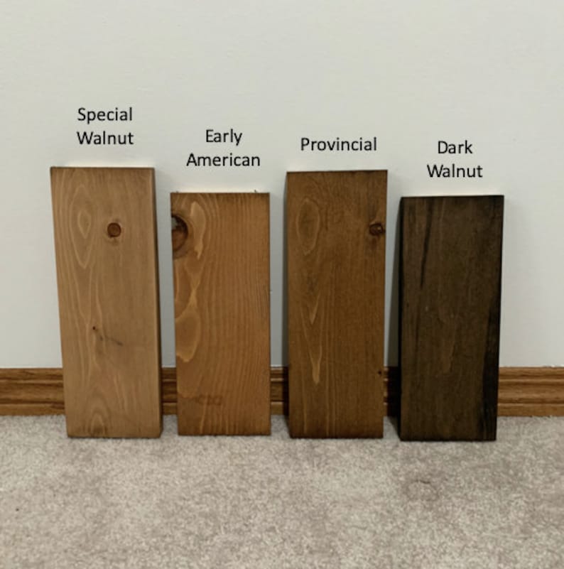May include: Four wood samples stained in different colors: Special Walnut, Early American, Provincial, and Dark Walnut.