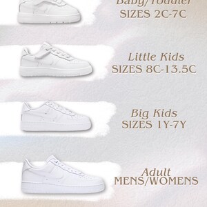 May include: White trainers for babies, little kids, big kids, and adults. The image shows different sizes of the shoes with text indicating the size ranges: Baby/Toddler, Little Kids, Big Kids, and Adult. The text also says "PLEASE NOTE: Certain sizes may have a different appearance. Design may vary slightly."