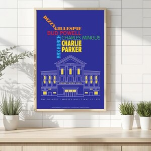 May include: A rectangular poster with a blue background featuring a white line drawing of Massey Music Hall. Text includes Dizzy Gillespie, Bud Powell, Charles Mingus, Max Roach, Charlie Parker, and The Quintet Massey Hall May 15 1953.