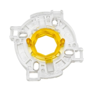 May include: A clear plastic ring with a yellow hexagonal insert in the center. The ring has multiple small holes around the edge.
