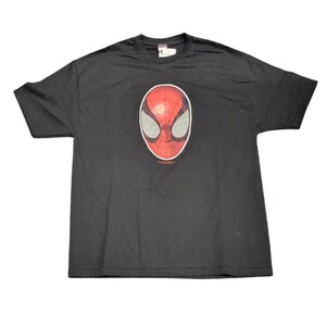 May include: Black t-shirt with a red and black Spider-Man mask graphic.