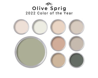 Peut inclure: Un ensemble d'échantillons de couleurs de peinture, dont la couleur de l'année 2022 de PPG, Olive Sprig. Les échantillons sont disposés en cercle, avec l'échantillon Olive Sprig au centre.