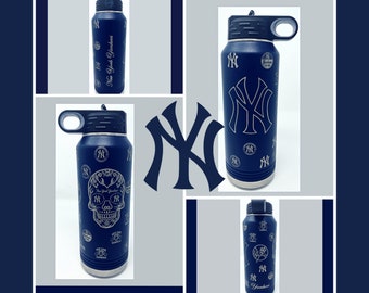 May include: Four different designs of stainless steel water bottles with a navy blue finish and white engraved designs. The designs include the New York Yankees logo, a skull with floral details, and a variety of other team logos.