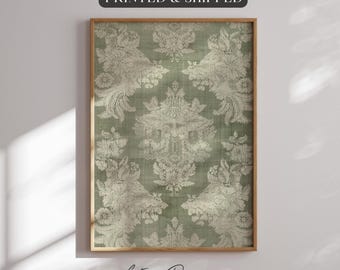 May include: A framed print of a vintage green and white damask pattern. The print features a repeating design of stylized flowers and leaves.