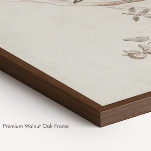 May include: A framed wall art piece featuring a botanical illustration of branches with leaves and fruit on a cream-colored background. The artwork is encased in a dark brown premium walnut oak frame with a visible wood grain texture and mitered corners.