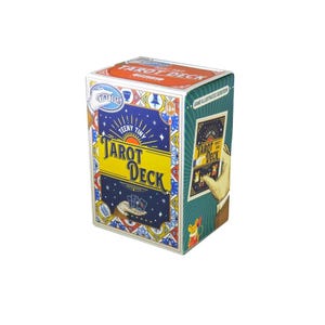 May include: A colorful box of a Teeny Tiny Tarot Deck. The box features a blue and yellow design with the words "Tarot Deck" prominently displayed. The box also has illustrations of cards and hands.