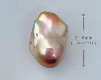 May include: A large, iridescent, baroque pearl with a pink hue. The pearl measures 21.6 mm (0.85 inches) in diameter. BPA-0266