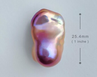 May include: A large, iridescent, pink pearl with a baroque shape. The pearl measures 25.4 mm (1 inch) in diameter. BPA-0265