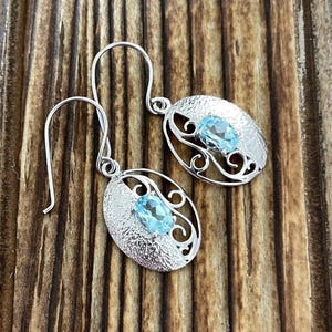 Blue Topaz Sterling Silver Dangle Earrings, Faceted Oval Gems, Textured Scroll Design