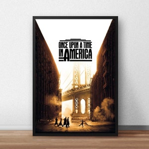 May include: A black and white poster with the title "Once Upon a Time in America" in bold, black lettering. The poster features a silhouette of a bridge in the background and a group of people walking in the foreground.