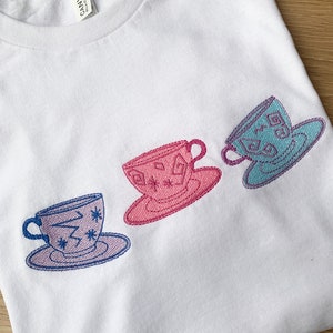 Teacups Embroidered White T-Shirt Embroidered with a Trio of Teacups