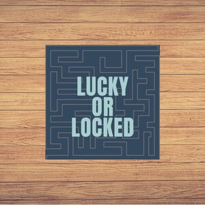 May include: A blue square with a maze pattern and the text "LUCKY OR LOCKED" in white letters.