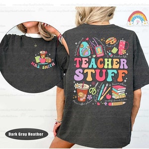 Colorful, bold lettering spells out TEACHER STUFF, framed by delightful illustrations of a backpack, a clipboard, scissors, and a pencil, encapsulating a playful take on school accessories.