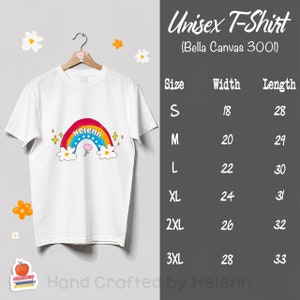 May include: White unisex t-shirt with a rainbow design featuring the name "Helenn" and a small flower. The shirt is available in sizes S-3XL with corresponding width and length measurements in inches.