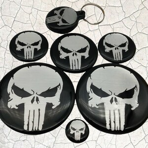 a bunch of plates with skulls on them
