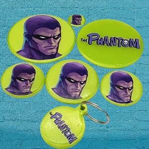 a bunch of frisbees with a picture of a man on them