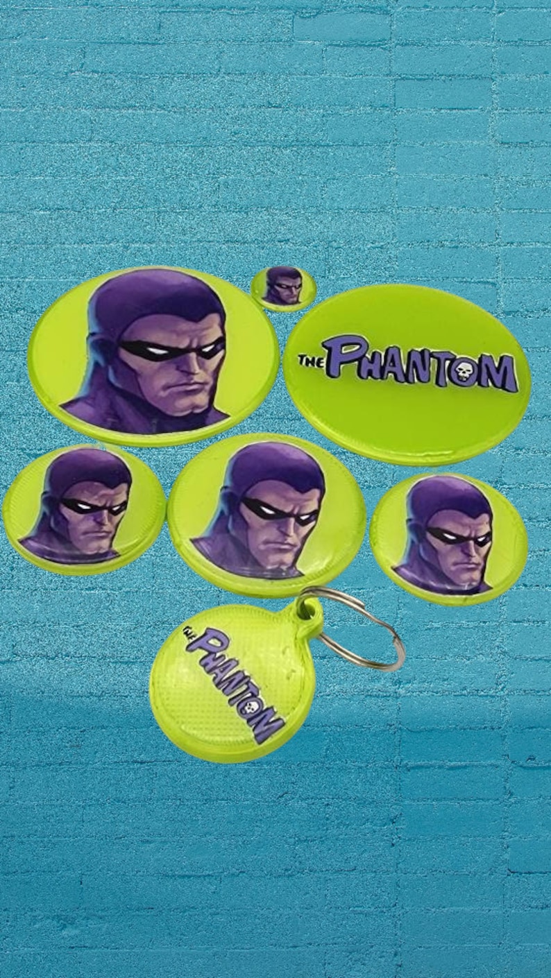 a bunch of frisbees with a picture of a man on them