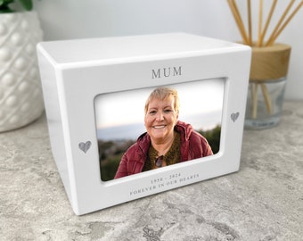 May include: White wooden photo box with a picture frame and the words "MUM" and "FOREVER IN OUR HEARTS" with the dates "1950 - 2024".