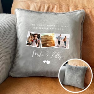 May include: A gray decorative pillow with a soft, plush texture. The pillow features three framed photos and the text "THE GOOD THINGS IN LIFE ARE BETTER WITH YOU." Below the photos is the text "Mike & Kelly" with two small white hearts.