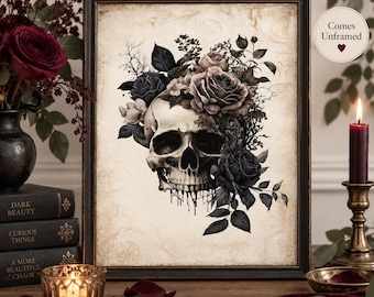 May include: A framed wall art print featuring a human skull adorned with dark roses and foliage on a vintage-style parchment background. The skull is depicted with dripping ink details at the base. A circular text overlay reads Comes Unframed.