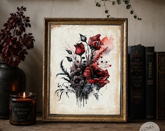 Puede incluir: Una lámina artística enmarcada con una ilustración estilo acuarela de rosas rojas y follaje oscuro sobre fondo crema. La obra muestra pétalos de color rojo intenso, tallos negros y salpicaduras de tinta. El marco es dorado y ornamentado.