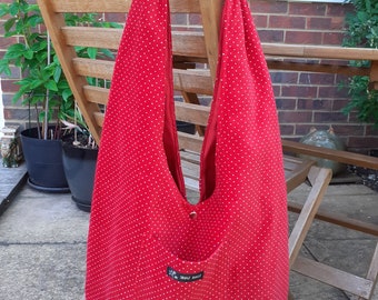 Red polka dot velvet slouch bag