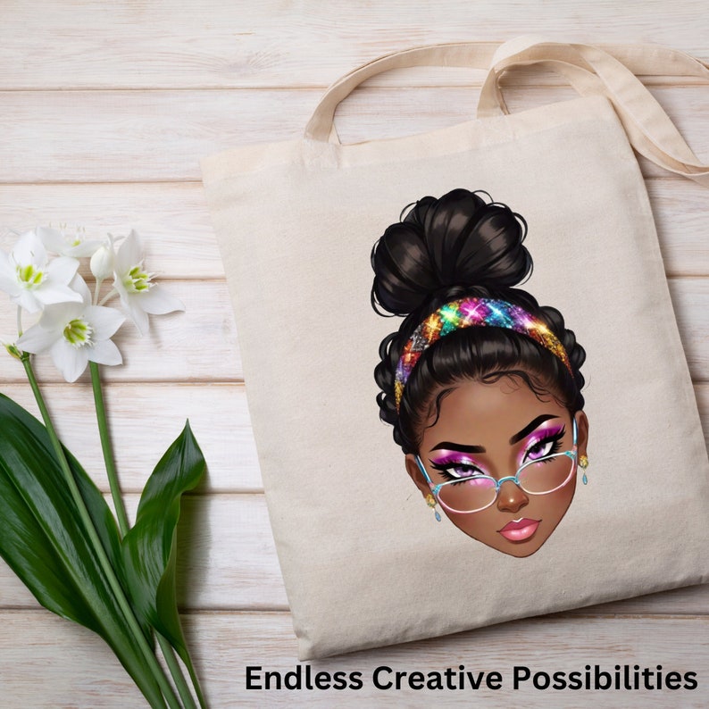 May include: A white tote bag featuring a colourful illustration of a woman with a bun and glasses. The woman is wearing a colourful headband. The text "Endless Creative Possibilities" is printed at the bottom of the bag.