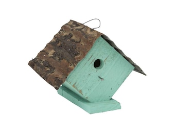 Unique Wren Birdhouse Made out of 100% recycled materials, 1-1/8" hole. Attracts Bewick's wrens, house wrens, titmice and chickadees.