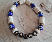 White "Karma" bracelet