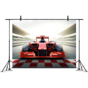 May include: A red Formula One race car positioned on a track with a red and white checkered starting line. The vehicle features a low-profile aerodynamic body, wide black tires, and a central cockpit, set against a blurred speedway background.