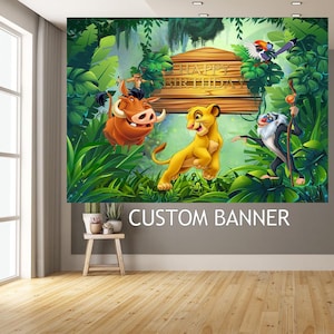 May include: A rectangular wall banner featuring a jungle scene with a wooden sign that reads HAPPY BIRTHDAY. The banner displays cartoon characters including a lion cub, a warthog, a mandrill, and a hornbill bird surrounded by green foliage.