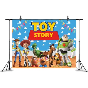 May include: A rectangular backdrop featuring the Toy Story logo in yellow and red text against a blue sky background with clouds and bunting. The characters Woody, Jessie, Rex, Bullseye, Mr. Potato Head, and Buzz Lightyear are shown.