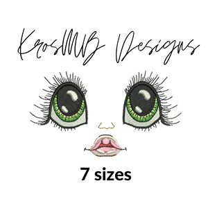 May include: Embroidered design of a cartoon face with large green eyes, a small nose, and a pink mouth. The text "7 sizes" is below the face.