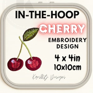 Può includere: Un disegno di ricamo con due ciliegie rosse e una foglia verde. Il testo recita "IN-THE-HOOP CHERRY EMBROIDERY DESIGN" con misure di 10x10cm. Il disegno è incorniciato in un quadrato grigio.