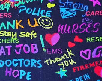 Gracias a nuestros héroes en tela de algodón negro de Print Concepts. Enfermera/Doctor/Bombero/Héroe/Tela EMS. Precio por 1 yarda